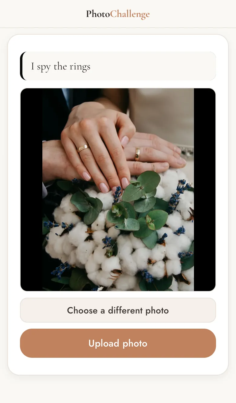 Upload screen with the item I spy the rings and a photo of two hands wearing wedding rings, ready to upload